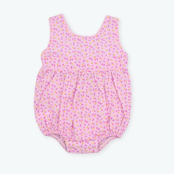 Asoleador Bebé Niña con Flores y Moño – Rosado